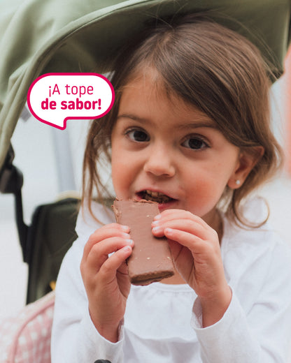 Girl eating a chocolate-covered wafer with no added sugar