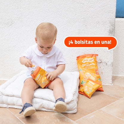 Niño comiendo snack de maíz en empaque multipack