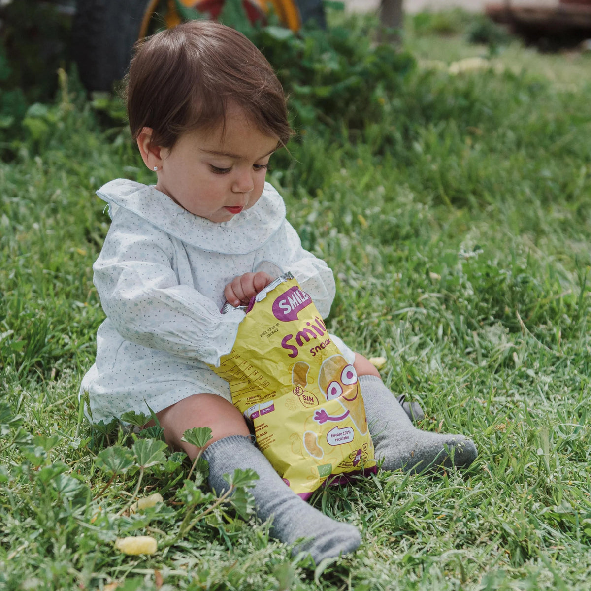 baby eating corn smilitos