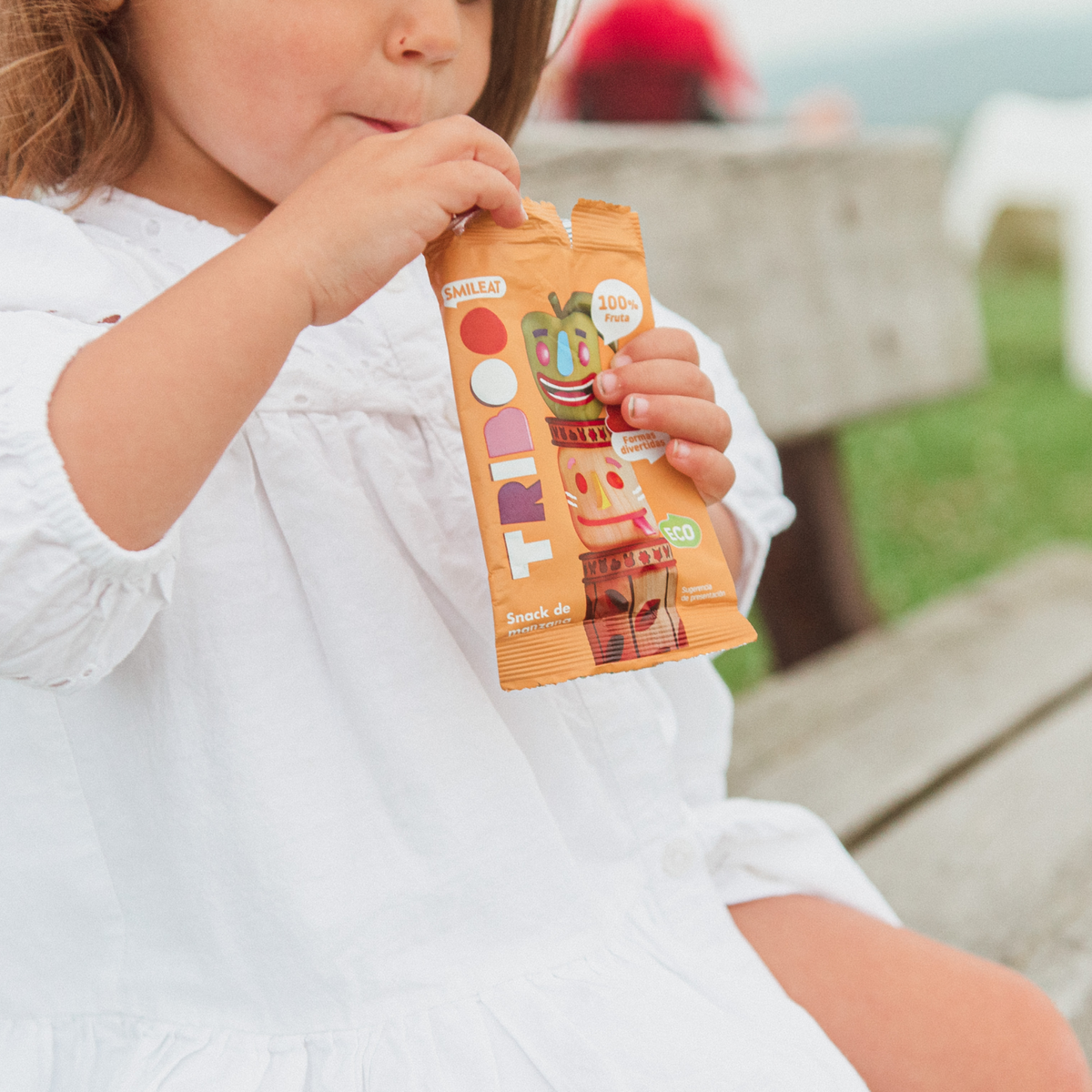 child eating the apple snack